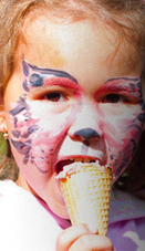 Girl with face painted at party